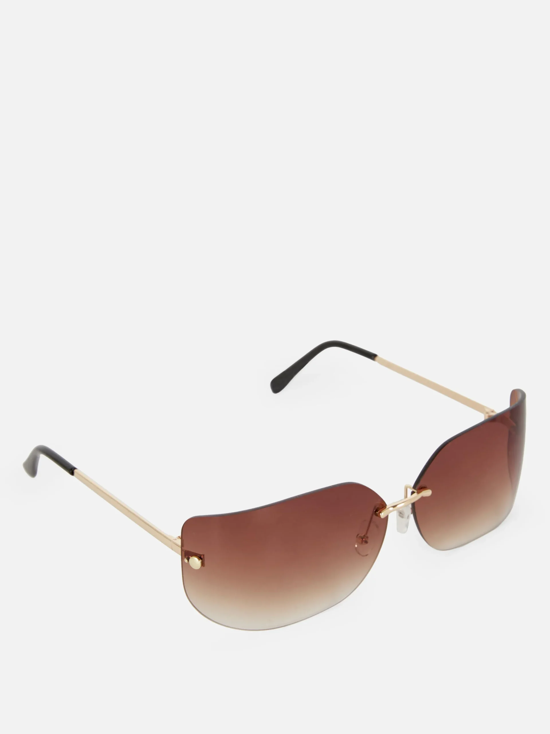 Rita Ora Curved Rimless Sunglasses|Primark Best